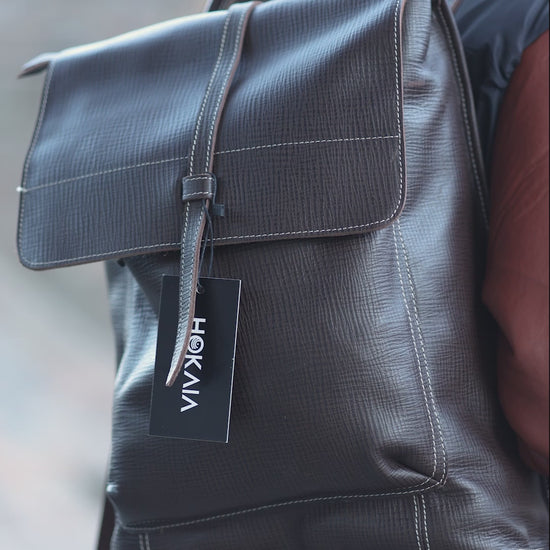 Hokaia Brown Leather Backpack worn by a model