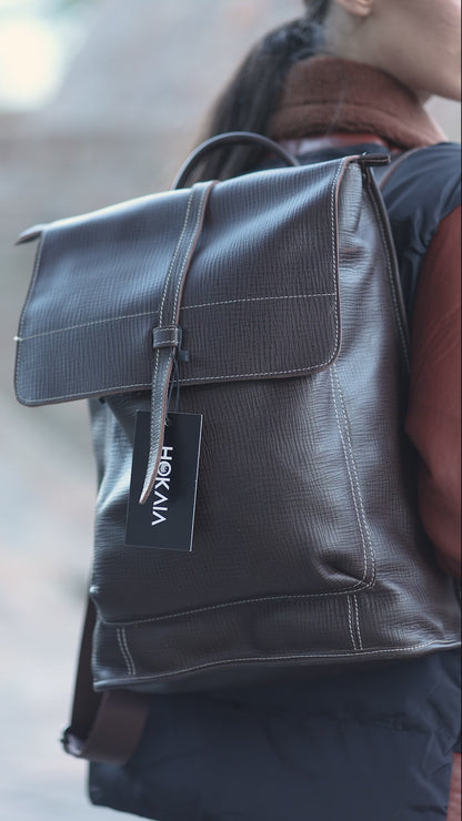 Hokaia Brown Leather Backpack worn by a model